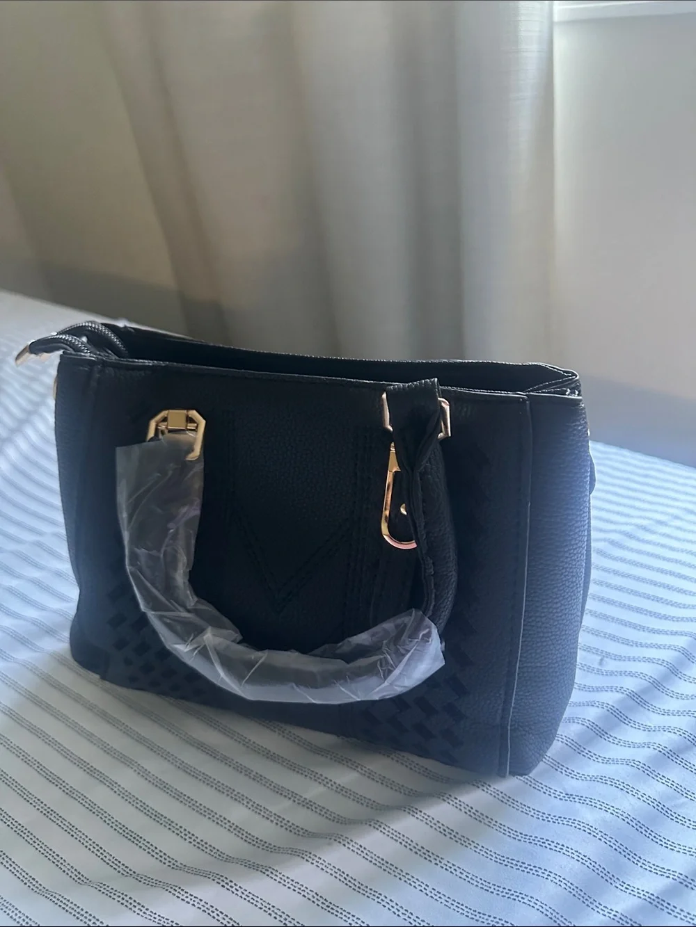 Black structure Macy’s brand full Leather hand back